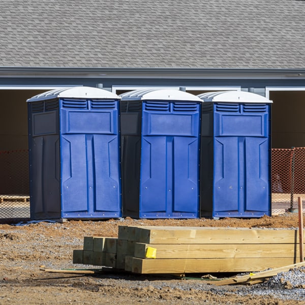 what is the cost difference between standard and deluxe porta potty rentals in Brownstown Michigan